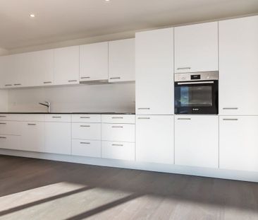 State-of-the-art attic apartment in a quiet location - Photo 4