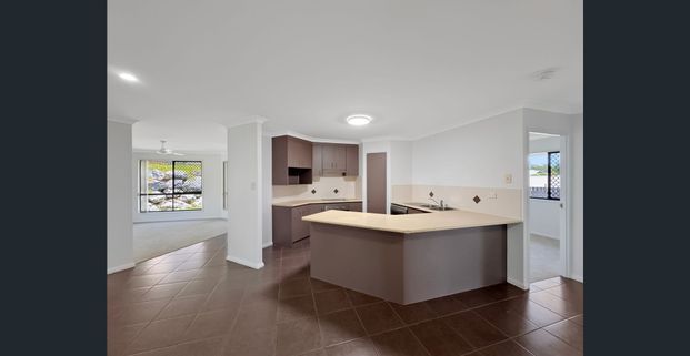 Freshly Renovated Four Bedroom Home with Huge Backyard! - Photo 1