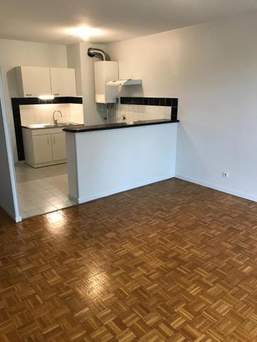 Location Appartement 2 pièces 47m² VAULX EN VELIN 69120 - Photo 2