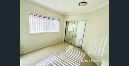 Modern four-bedroom home with luxury features and prime location - Photo 3