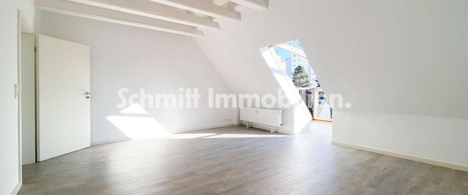 Helle 2-Zimmer Dachgeschoss-Wohnung mit Einbauküche in F-Goldstein - Foto 1