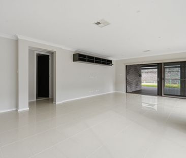 Spacious Family Home with Multiple Living Areas - Photo 3