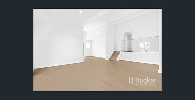 FULLY RENOVATED SPLIT-LEVEL HOME - Photo 1