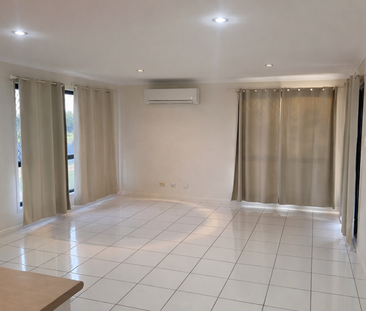 Modern Family Living on a Corner Block - Photo 1