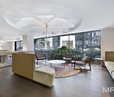 Luxury living with resort-style amenities in the iconic magnolia building - Photo 2