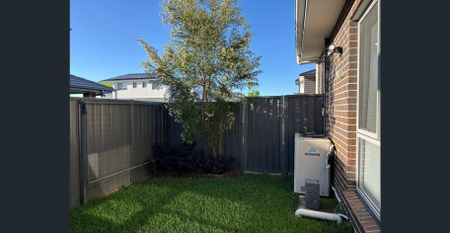 A beautifully family home in Nirimba Fields, just a 4-minute walk to Nirimba Fields Public School. - Photo 2