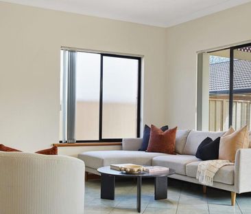 NEAT MODERN HOME IN FANTASTIC WESTERN SUBURB LOCATION - Photo 1