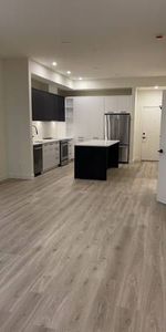 BRAND NEW Top Floor Condo 2Br 2 Bath 1Den & Parking - Photo 3