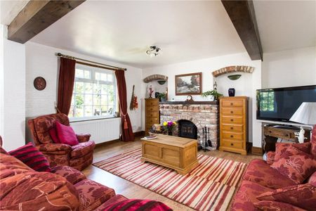 A charmingly traditional cottage with fabulous views over The Green, just on the edge of this charming rural village, only 8 miles south of York. - Photo 2