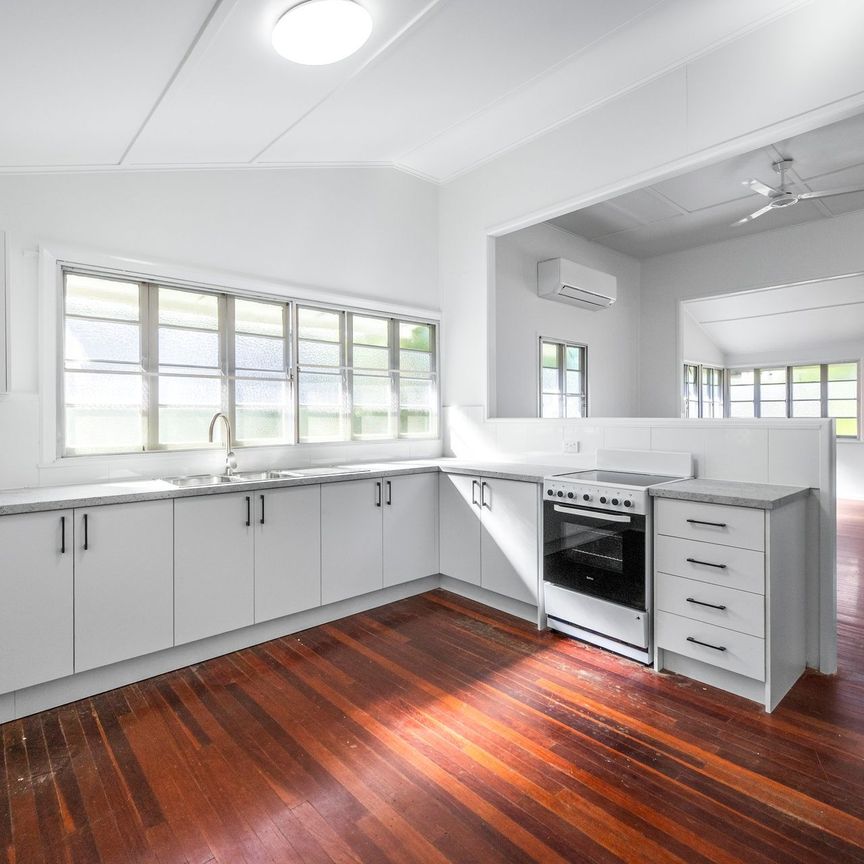 Queenslander Lifestyle Just Two Streets from the Strand - Photo 1