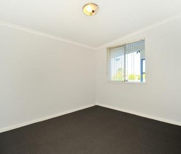 Coastal Comfort & Convenience - Charming Home in Prime Rockingham L... - Photo 2