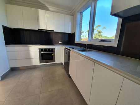 RENOVATED APARTMENT WITH LOVELY WATERVIEWS AND GARAGE - Photo 3