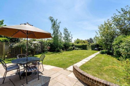 A bright, spacious four bedroom home set within a large plot boasting a superb mature garden with picturesque views. - Photo 3