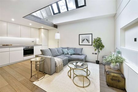 Beautifully finished and immaculate throughout, a split level one bedroom apartment with wooden floors ideally located moments from the Fulham Road. - Photo 4