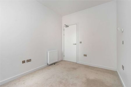 A bright, modern two-bedroom, two-bathroom apartment on the third floor with lift access, beautifully presented and move-in ready. - Photo 4