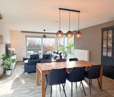 Halfopen woning met 3 slaapkamers, tuin en garage. - Photo 2