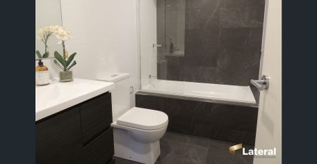 MODERN 2 BED APARTMENT WITH ROOFTOP POOL AND GYM - Photo 4