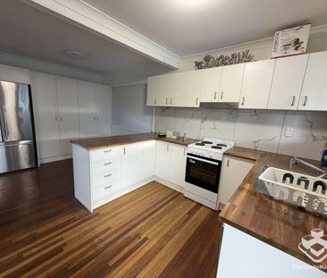 Neat & Convenient 3 Bedroom Home in Great Location - Photo 2