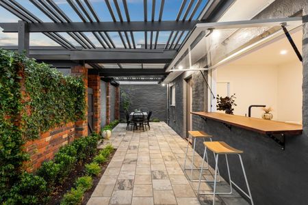 STUNNINGLY RENOVATED HOME ONLY METERS FROM THE BEACH - Photo 2