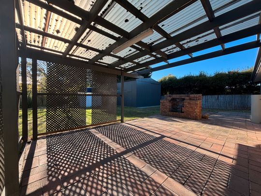 Charming Three-Bedroom House with a Huge Shed! - Photo 1