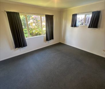 Tucked away in Forest Lake, this charming three-bedroom home awaits... - Photo 3