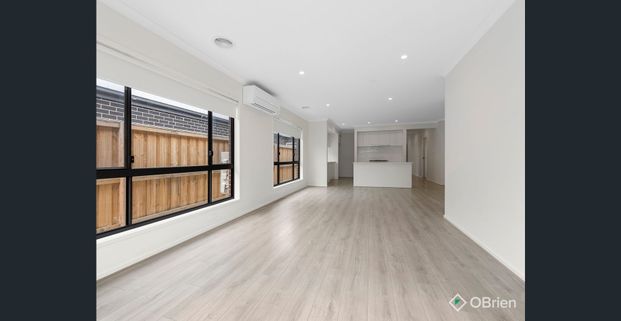 Modern Four-Bedroom Home with Low-Maintenance Living - Photo 1