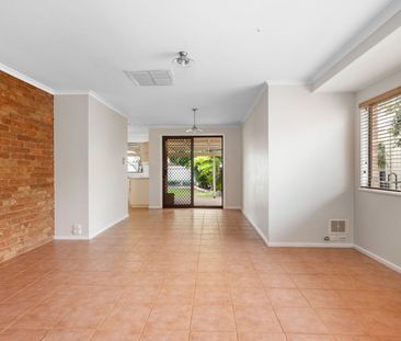 Neat and tidy brick home in ideal location - Photo 2
