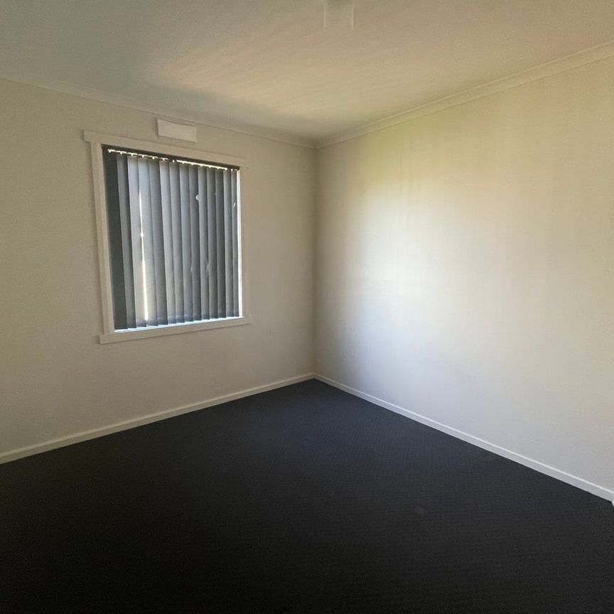 Sunny Suburban Home - Photo 1