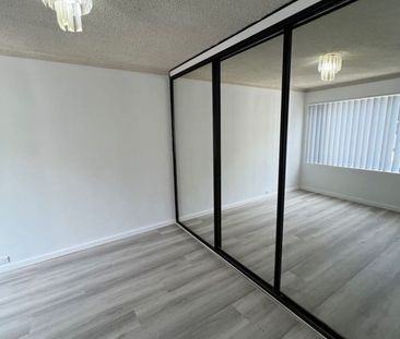 Fresh & Convenient 2-Bedroom Unit with Lock-Up Garage - Photo 4