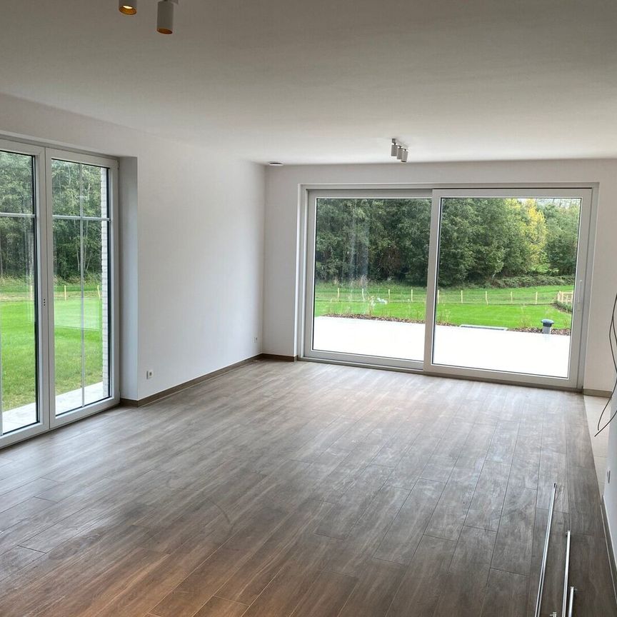 NIEUWBOUW prachtig afgewerkte 3-gevelwoning met grote tuin, ideaal gelegen in een rustige buurt en op 25min van centrum Leuven. - Photo 1