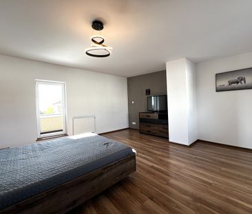 Komfortowy 2-poziomowy apartament na wynajem - Photo 4