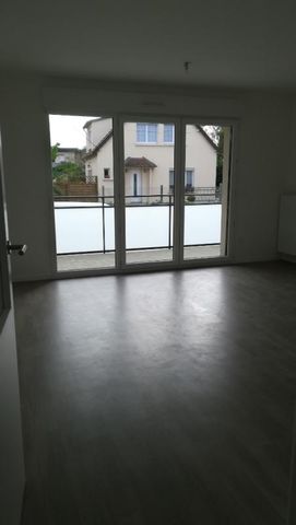 Location Appartement 2 pièces 47m² HEROUVILLE ST CLAIR 14200 - Photo 4