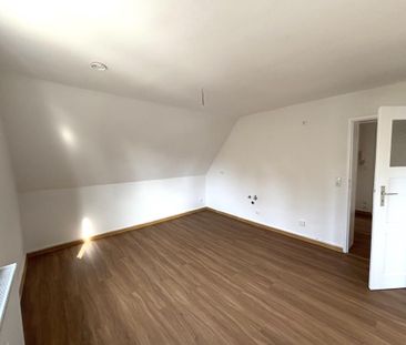 Gemütliche Dachgeschosswohnung in Waldrandlage - Foto 1