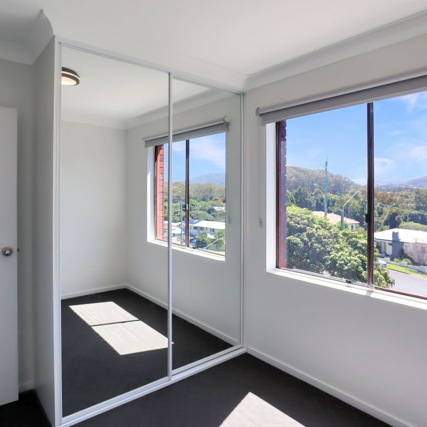 Modern Comfort in a Convenient Coastal Setting - Photo 1