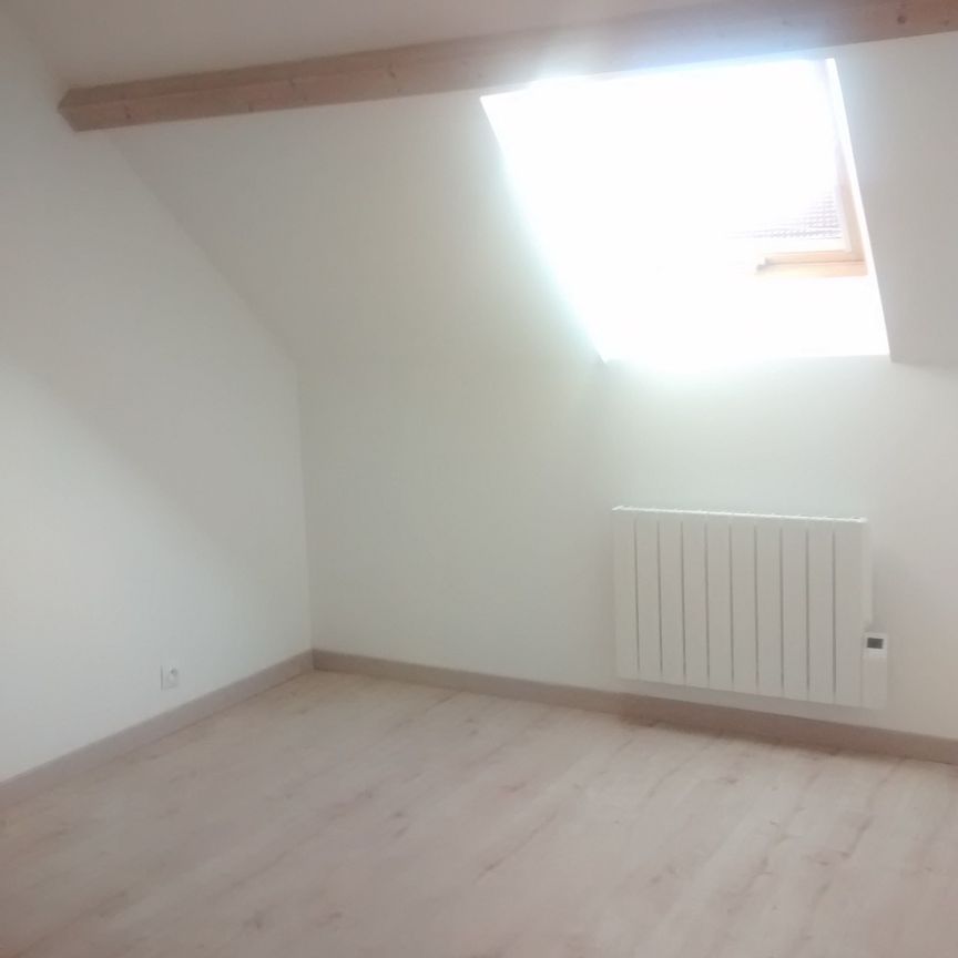 Maison mitoyenne de 59 m² comprenant séjour avec cuisine ouverte, 2 chambres, salle d'eau avec WC. - Photo 1