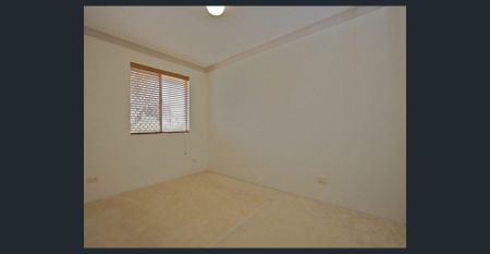 Beautiful Two-Bedroom Unit in Serene Surroundings - Photo 4