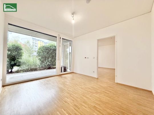 Gemütliche Erdgeschosswohnung mit Terrasse - Wohnen in Grünlage! - Foto 1