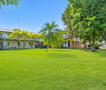 Spacious Three-Bedroom Unit in Convenient Location - Photo 6