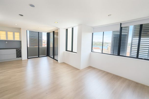 Spacious Four-Bedroom Home with Split-Level Design in a Peaceful Harbourside Setting - Photo 1