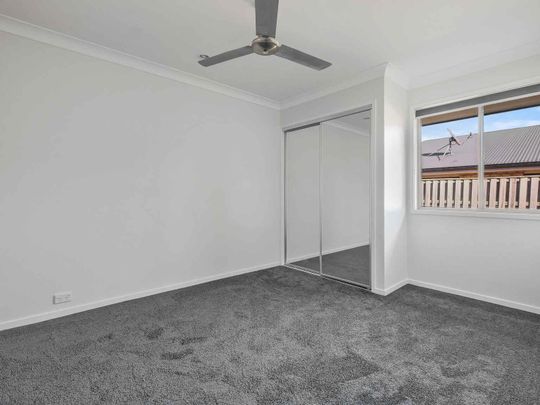 Newly Renovated Family Home with Fencing Upgrade in Prime Raceview Location - Photo 1