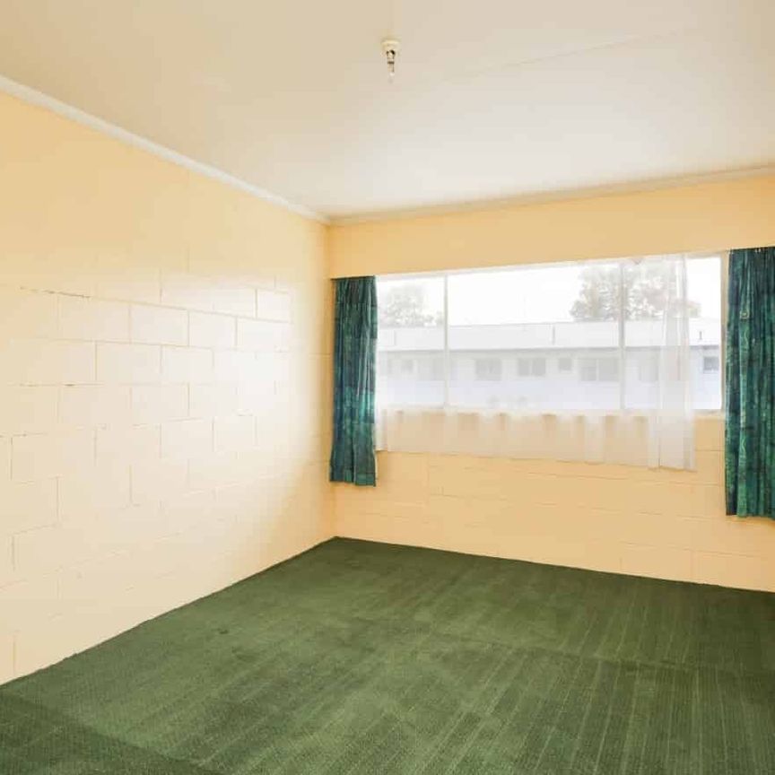 Bright and Private Rear Upstairs 2-Bedroom Unit - Photo 1