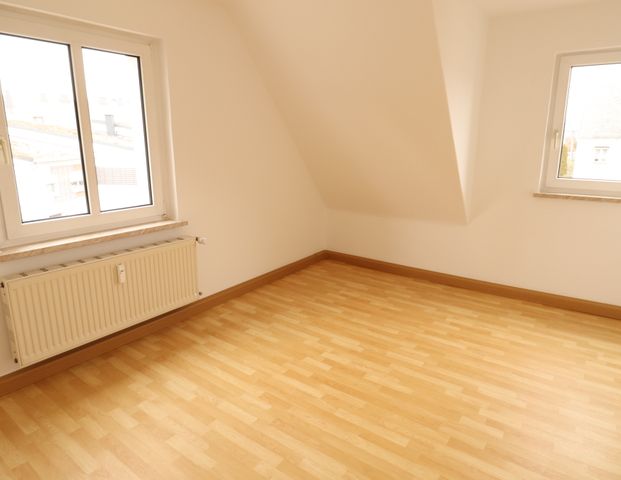 individuelle Wohnung im Dachgeschoss - Photo 1