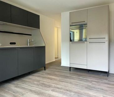 Renovated 3.5-room apartment on the ground floor - Photo 1