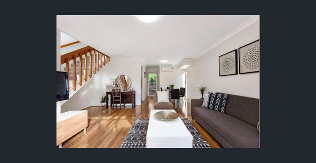 Split Level Townhouse in Private Setting - Photo 1