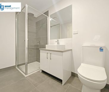 Modern 2-Bedroom Townhouse in a Prime Location! - Photo 6