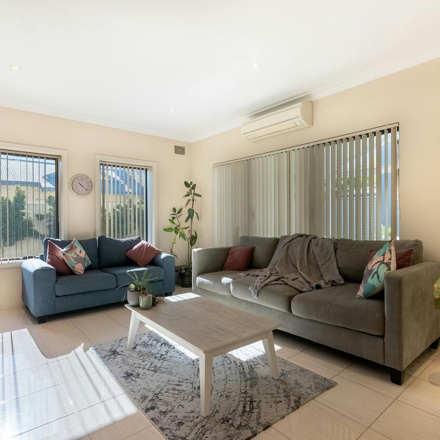 AVAILABLE NOW Coastal Living at Its Best -Spacious, Stylish & Superbly Located - Photo 1