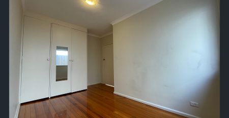 Bright 2-Bedroom Unit with Private Courtyard, Carport & Storeroom - Photo 3