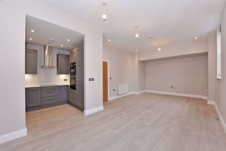 A modern two bedroom first floor apartment with one allocated parking. - Photo 2