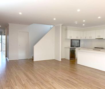 Spacious 3-Bedroom Home with Modern Kitchen & Entertainer’s Backyard - Photo 2