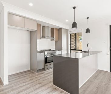 Charming 3-Bedroom Duplex in Logan Reserve! - Photo 4